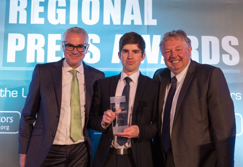 Gareth Davies collects his fourth Weekly Reporter of the Year award at this year's Regional Press Awards 2016