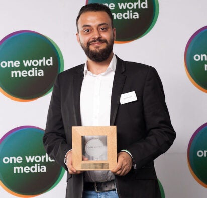 Hassam Eesa, co-founder of Raqqa is Being Slaughtered Silently, collects the Special Award at the One Wold Media Awards